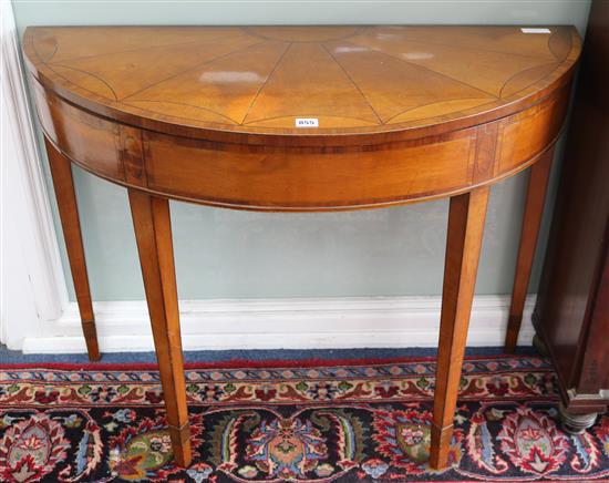 An Edwardian inlaid satinwood card table W.100cm
